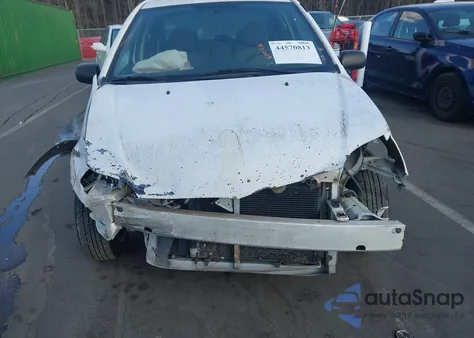 2002 Toyota Echo z USA, uszkodzony, nr VIN JTDBT123320223374